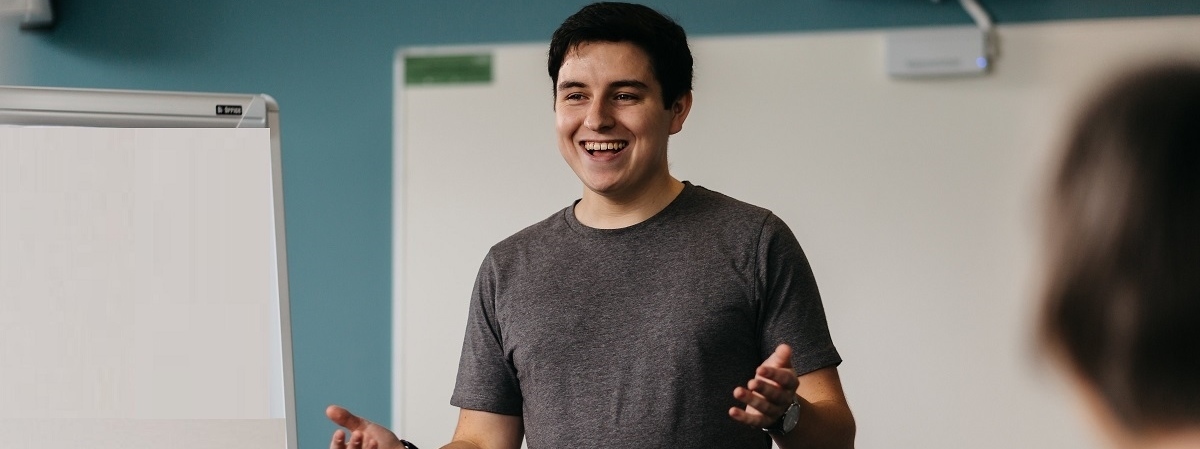 Phil talking to fellow students