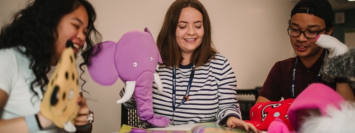 Students working with educational toys