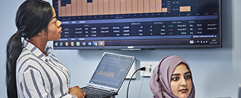 Business School - About Us - Our Placements 341x139 - Women in a ftrading room