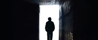 Centre for Applied Criminology Research Clusters Positive Criminology Quad Image 342x140 - Man in silhouette in a doorway