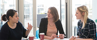 Doctorate of Business Administration Homepage Image 341x140 - Three women at a desk