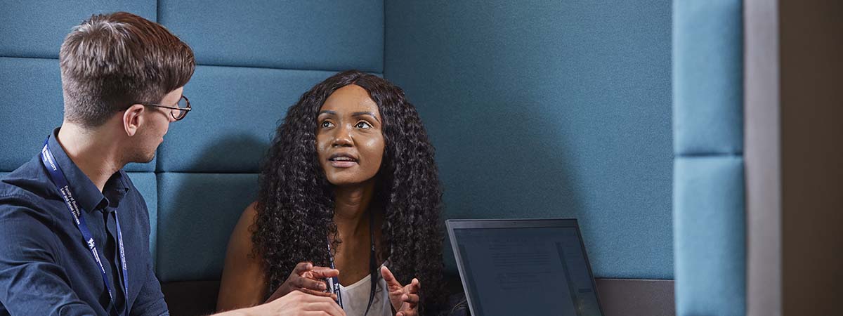 How YOU can get into accounting and management 1200x450 - Two people sat at a desk