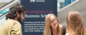 Management and Marketing Image 341x139 - Men and women at a desk
