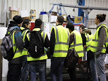 Architecture students at the Ash and Lacy workshop. Image supplied by Jim Sloan. Students visiting the Ash and Lacy wookshop