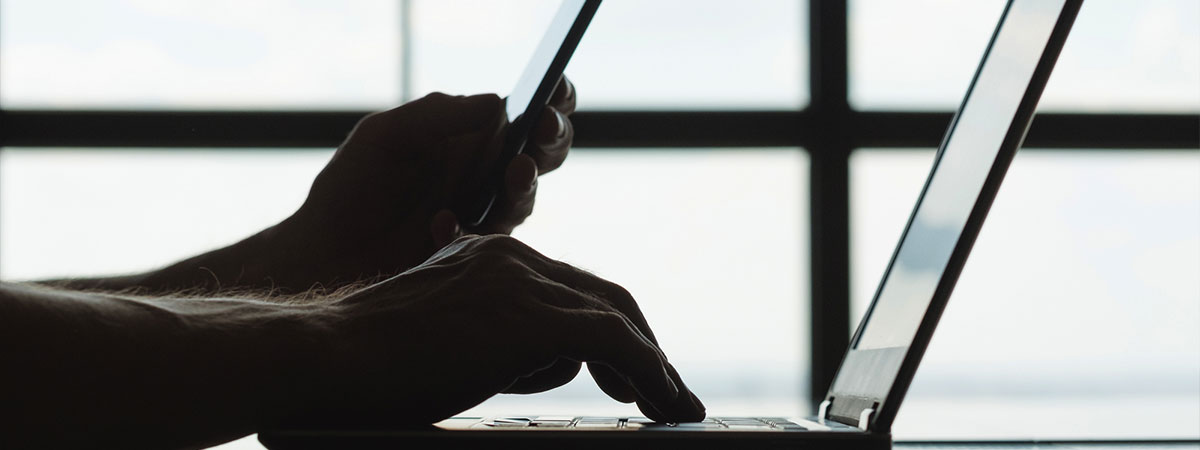Person using phone to log in