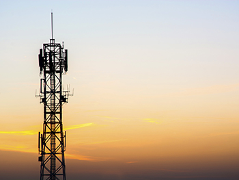 radio mast A radio mast against a sunset