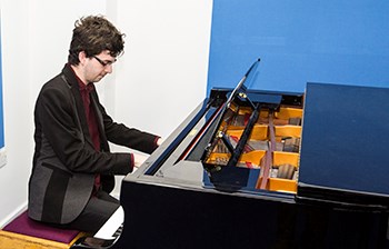 Steven Giles practices in the rehearsal rooms