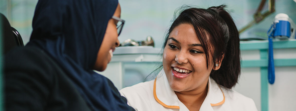 Healthcare student working with young person