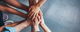 School of Law - Research - Research Projects - University Research Collaborations Image 341x149 - People holding hands