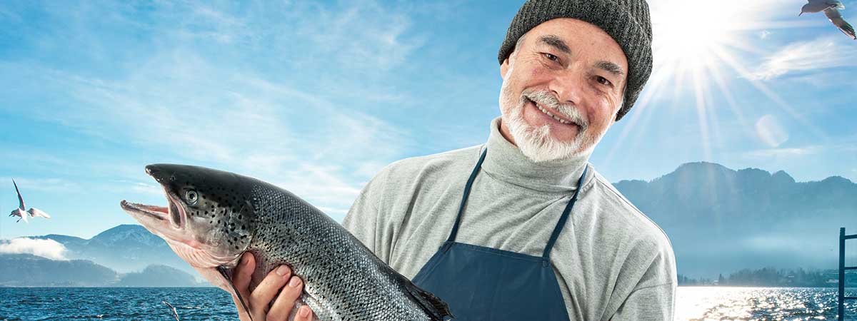Weird Law 1200x450: Man holding a salmon