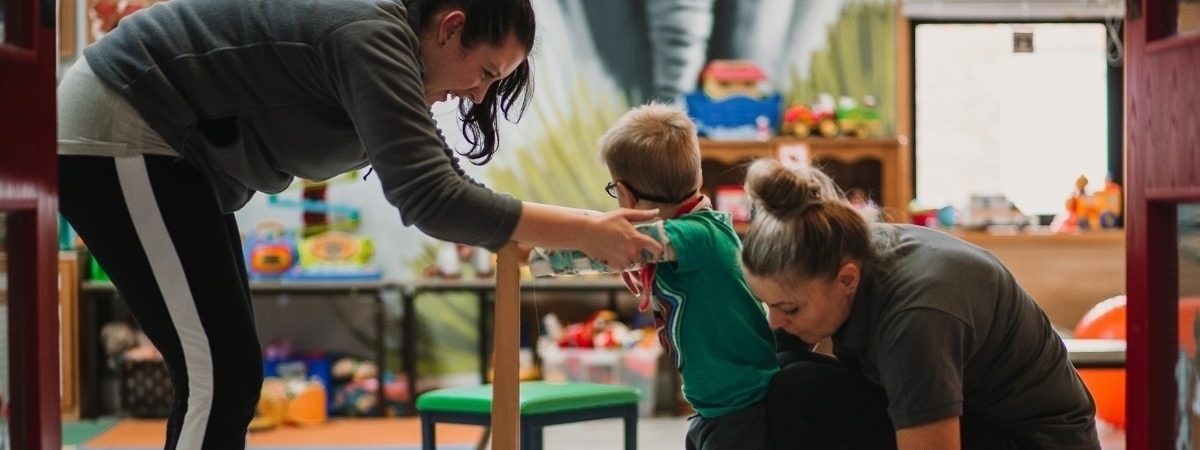 Conductive Education students working with child